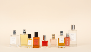 Mastering Fragrance Layering: How to Create a Signature Scent with PerfumeOutlet.com